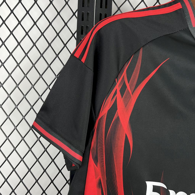 Camisola concept vermelha e preta com símbolo CINZA 2025/26